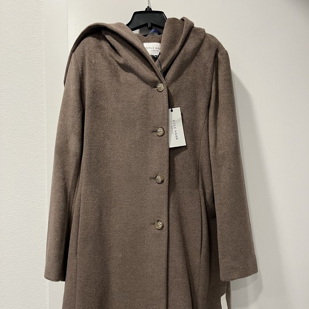 Stunning taupe wool blend coat with hood. Luxurious feel and flattering. NWT